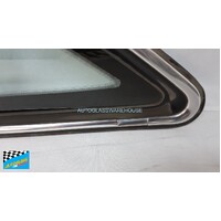 HOLDEN COMMODORE VN/VP - 9/1988 to 7/1993 - 4DR SEDAN - LEFT SIDE REAR OPERA GLASS - CHROME MOULD - ROUND CORNER - BOTTOM (490MM WIDE) - (SECOND-HAND)