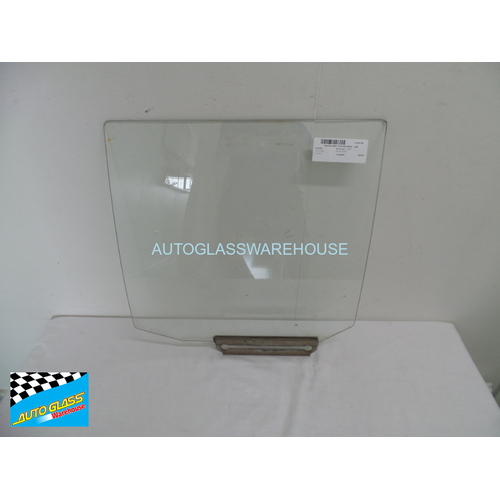 MAZDA 323 - 3/1977 TO 9/1985 - 4DR WAGON - PASSENGERS - LEFT SIDE REAR DOOR GLASS - GREEN - (SECOND-HAND)