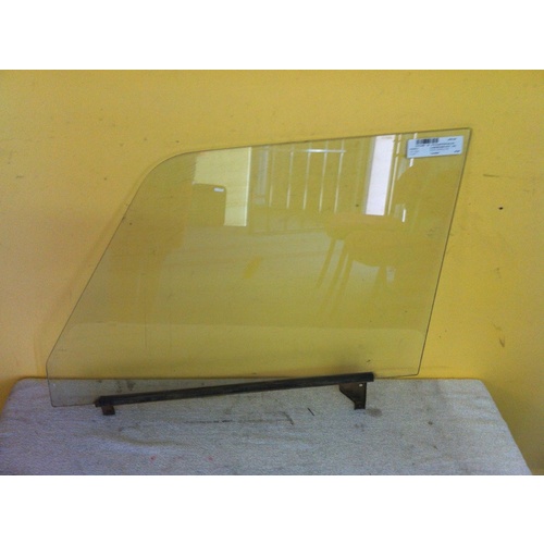 suitable for TOYOTA LANDCRUISER 55 SERIES - 1966 TO 1974 - WAGON - PASSENGERS - LEFT SIDE FRONT DOOR GLASS - ROUND FRONT TOP CORNER - (Second-hand)