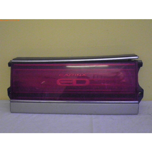 suitable for TOYOTA CARINA ED - 1992 TO CURRENT - 4DR SEDAN - REAR GARNISH BOOT LID - PP-PMMA** (WITH SILVER STRIP AT BASE) - (SECOND-HAND)